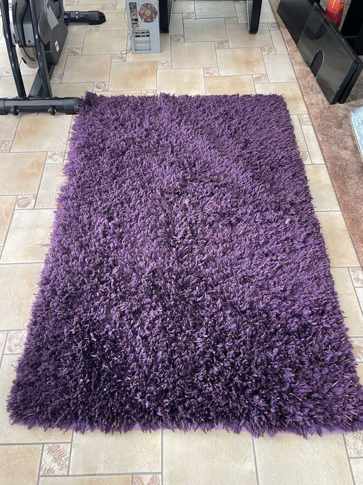 Tapete Roxo com retoques dourados