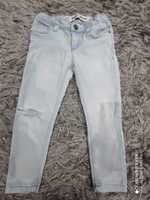 Śliczne jeansy denim porwane