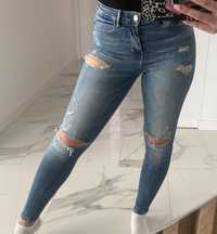 Spodnie jeansowe guess rozmiar s przetatcia dziury