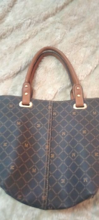 Malas tira colo e mão adaptáveis