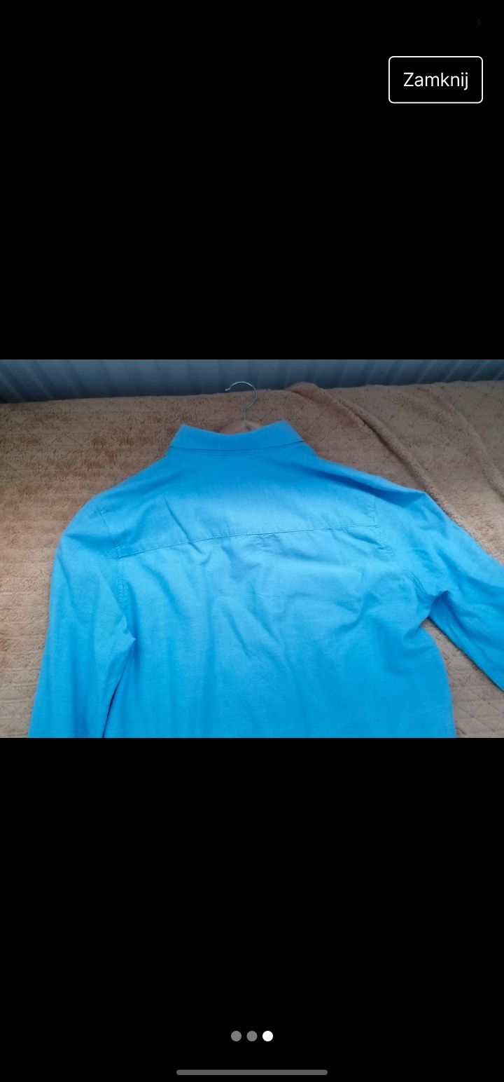 Męska niebieska koszula 164