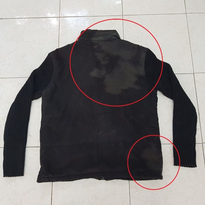 Casaco preto manchado c/ lixívia