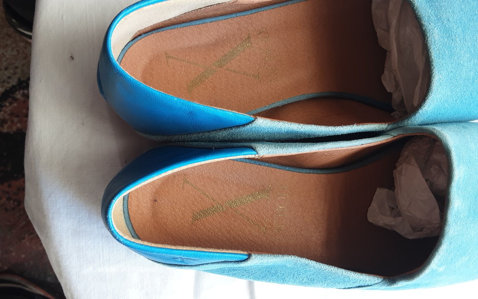Sapatos em pele azul