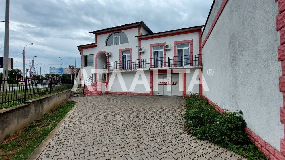 Земельна ділянка 26 соток з СТО, мийкою та готелем