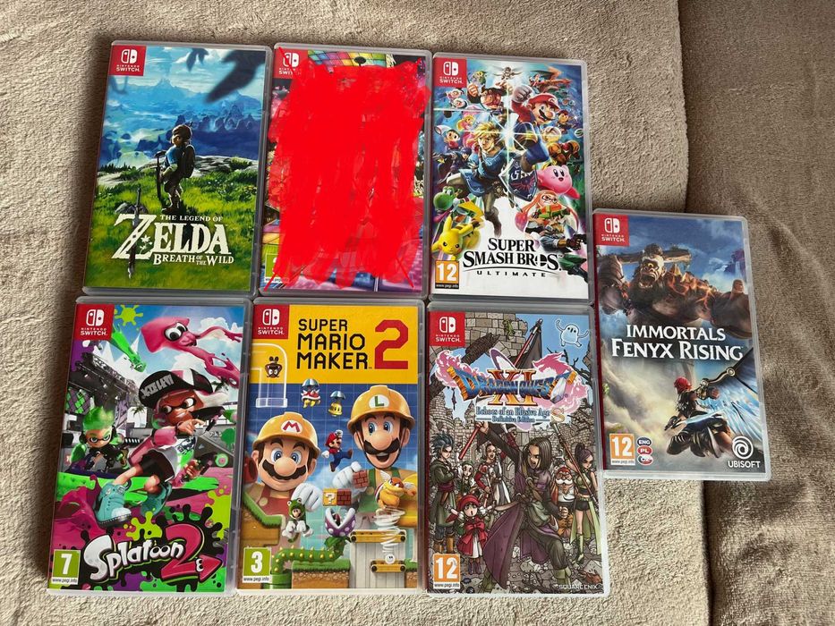 Nintendo Switch z 6 grami (wersje pudelkowe) + grip + ekstra pad