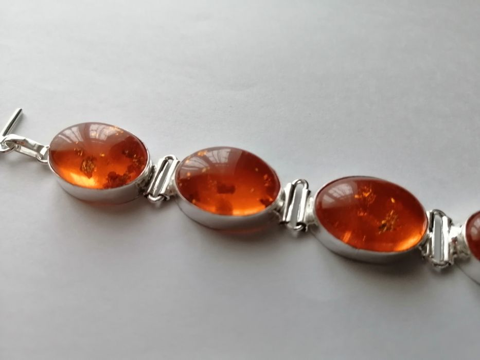 Срібний браслет, титанові друзи, бурштин