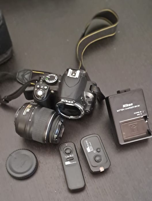 Nikon D3100 + objetiva