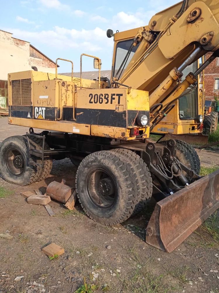 Екскаватор ківшовий Caterpillar