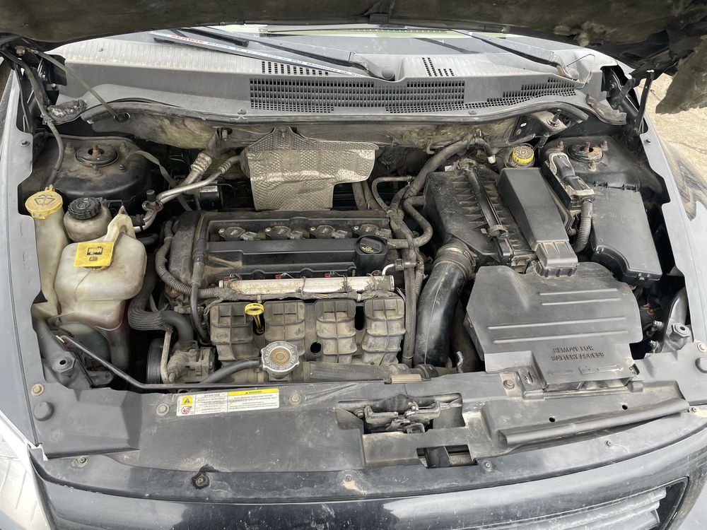 Na części Dodge Caliber 1.8 skrzynia DD7/T335 kod lakieru PXR