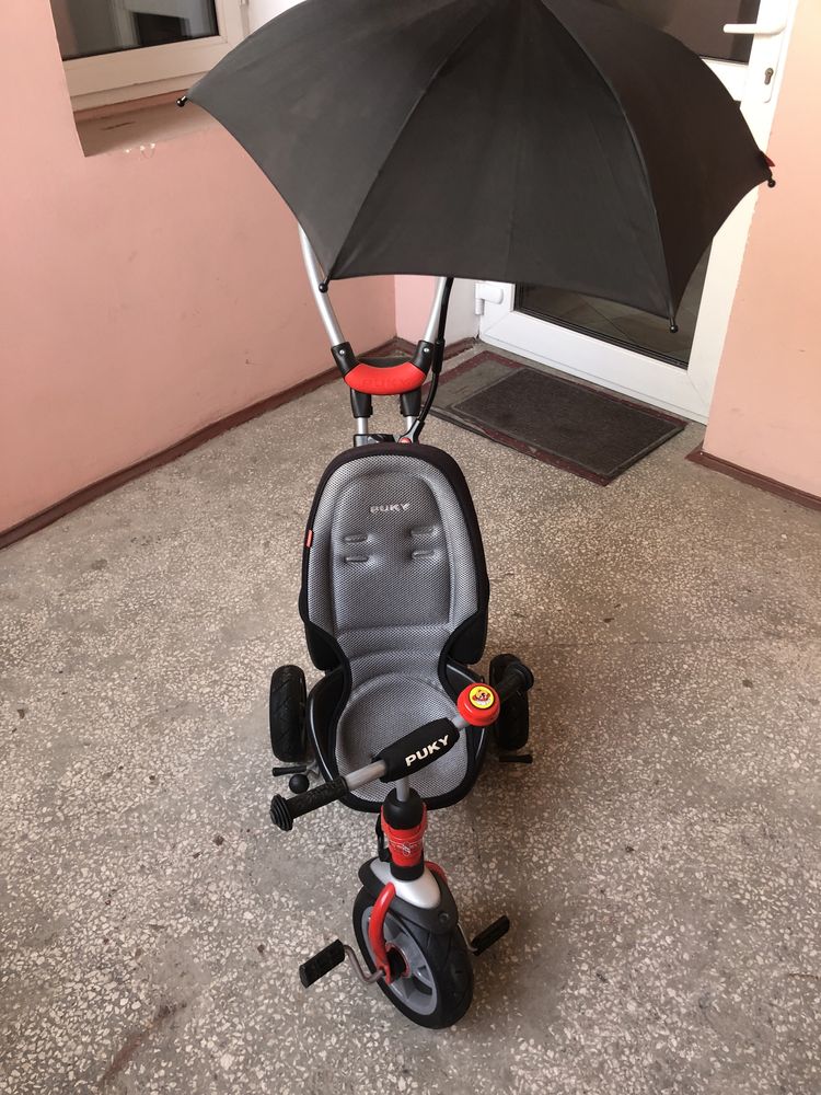 Велосипед с ручкой Puky с зонтиком, ABS, AC и гидроусилителем руля