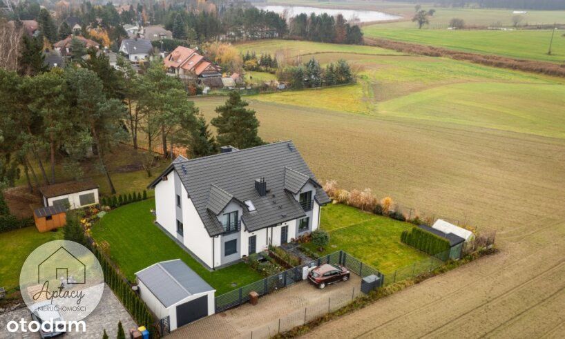 Dom przy lesie i jeziorze  z ogrodem