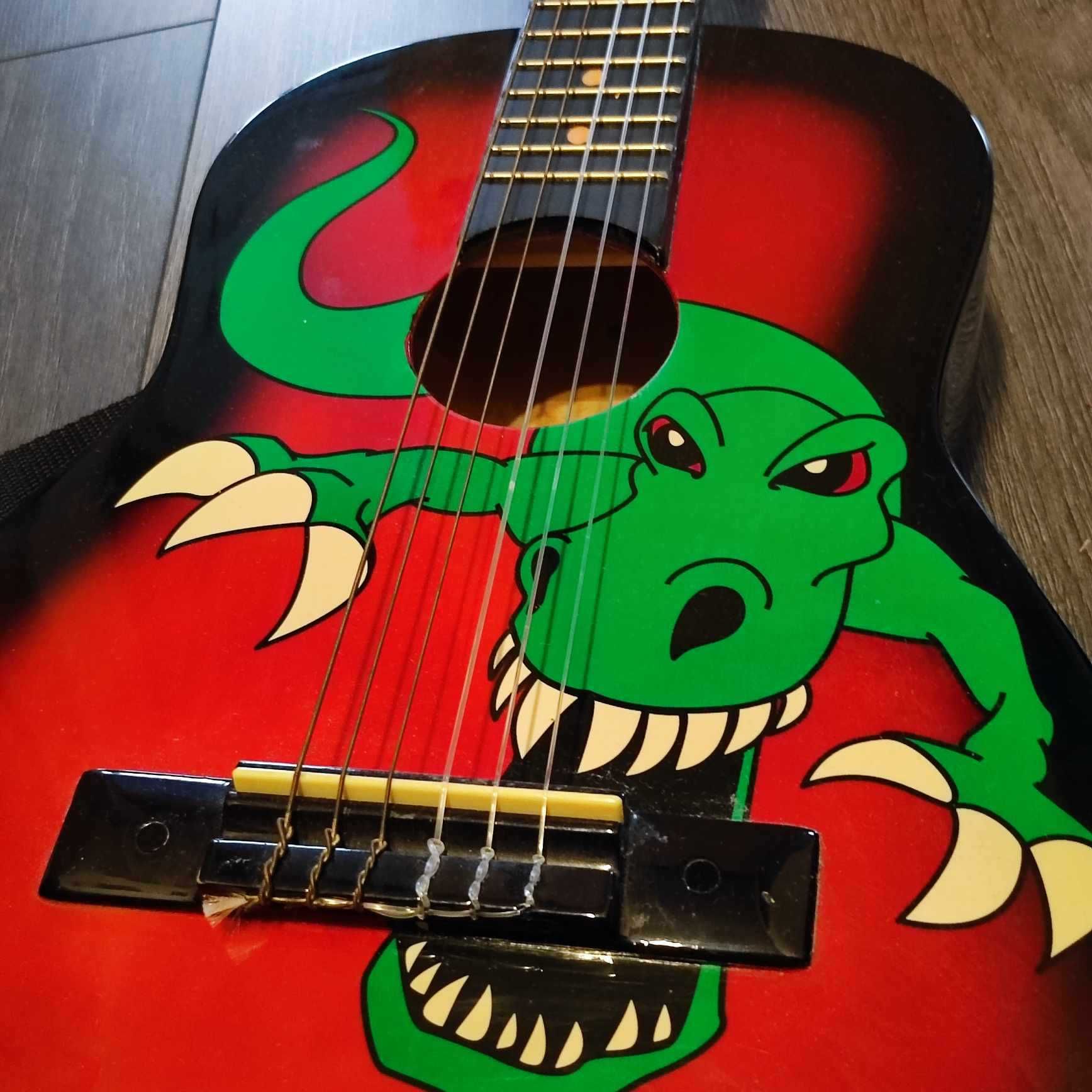 Gitara Stagg C505 R-Dino 1/4 z motywem dinozaura