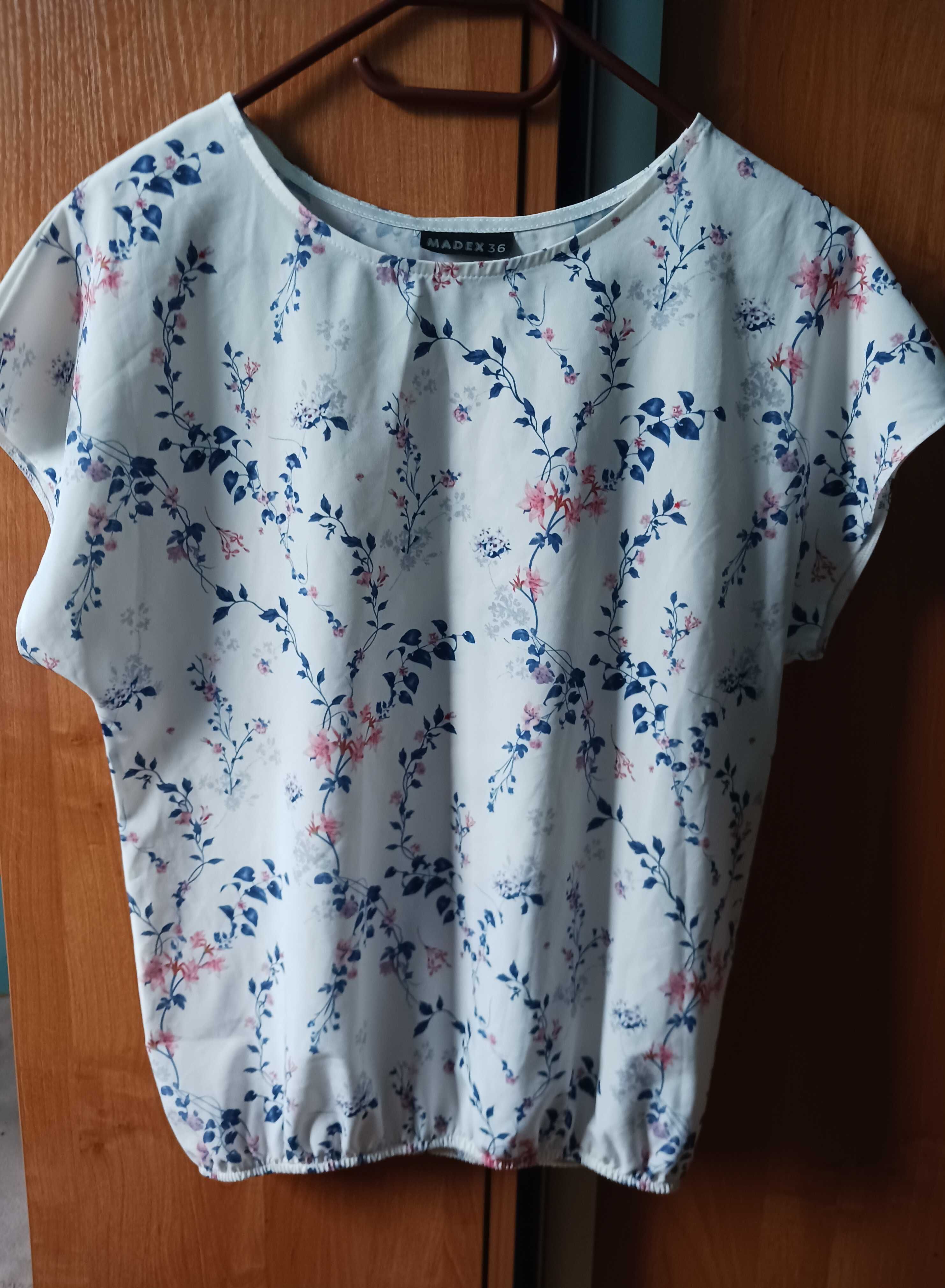 Biała elegancka bluzka w kwiatowy deseń 36/38