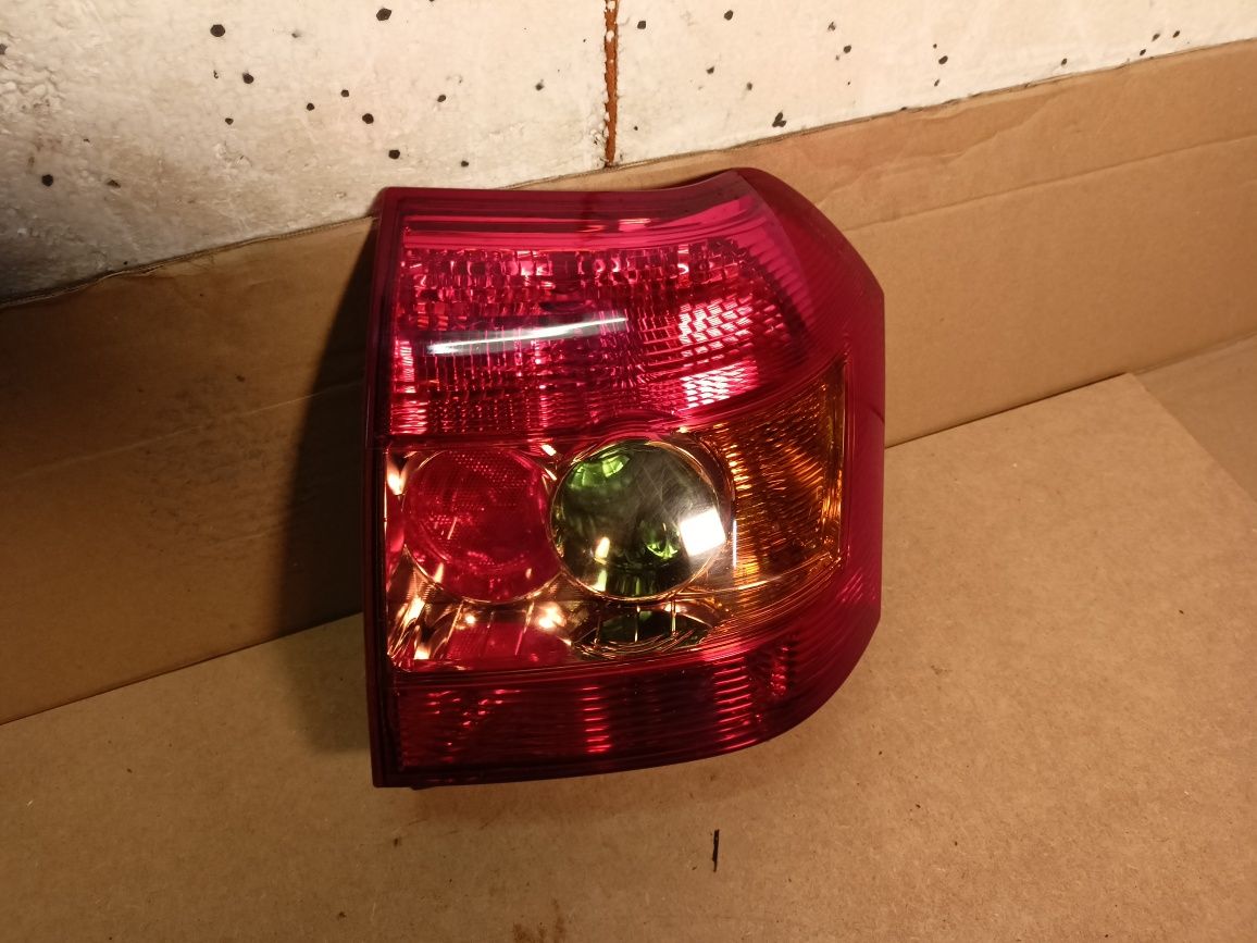 Lampa lewy tył lewa tylna toyota corolla e12 HB lift FL 04-07