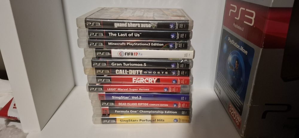 PS3 Slim 320 GB + 2 comandos + 2 microfones + 12 jogos + caixa e manua