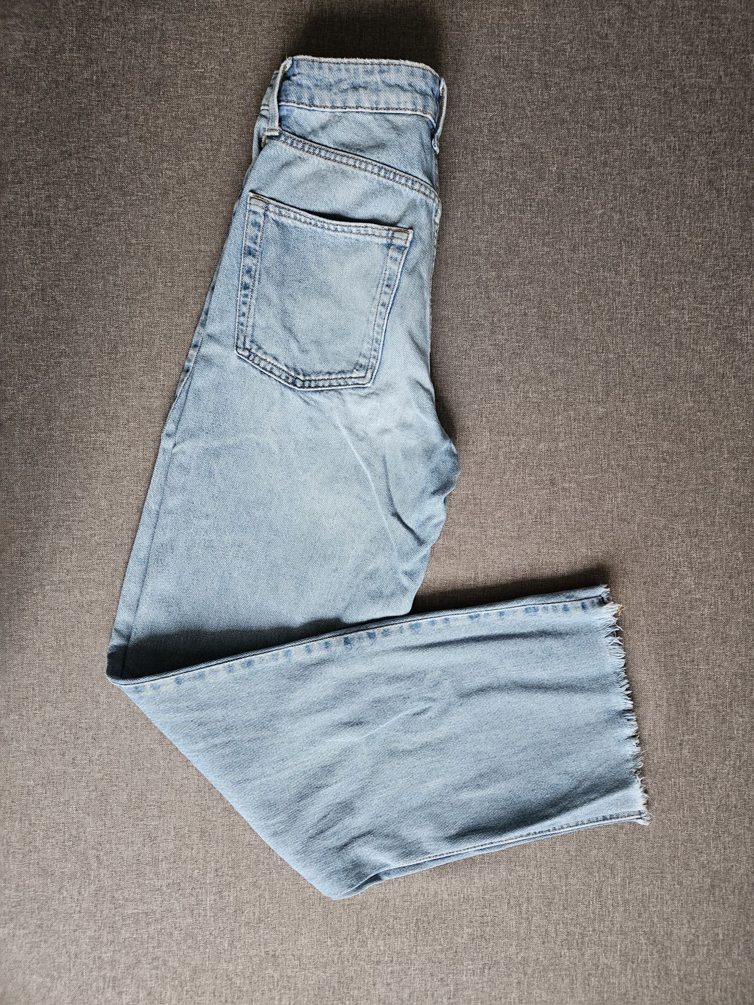 Dżinsy H&M rozm. 34 model wide z przetarciami