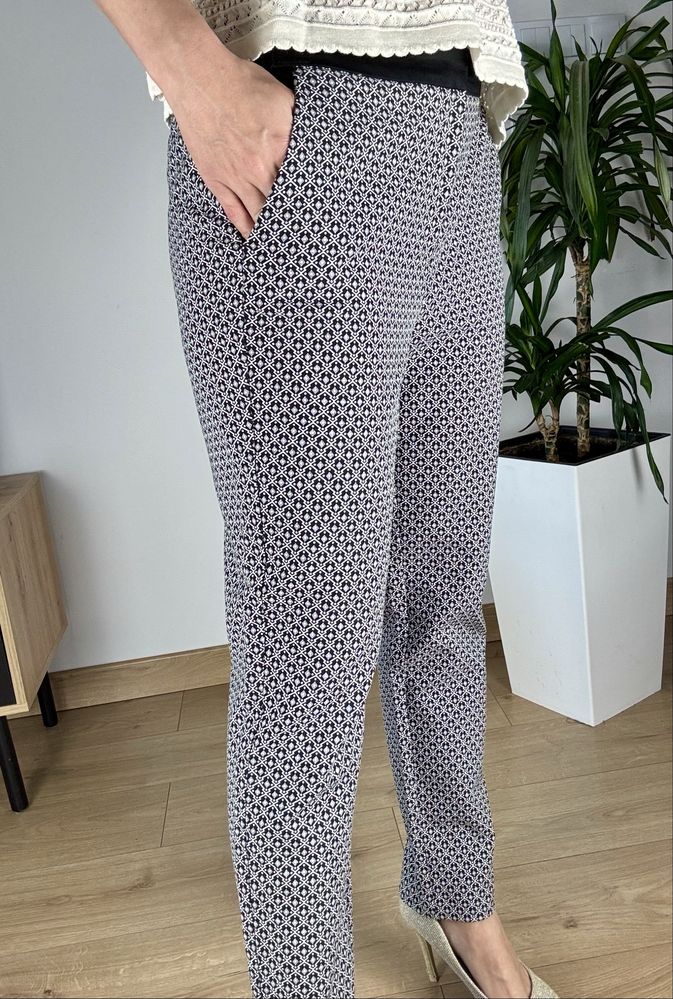 Eleganckie wygodne spodnie chinosy L XL biało czarne we wzory boho