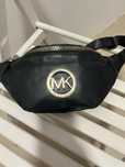 Saszetka nerka damska Michael Kors