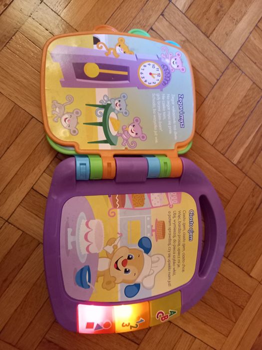 Grająca książeczka i laptop