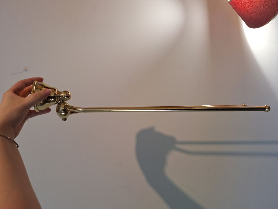 Toalheiro de parede em metal dourado