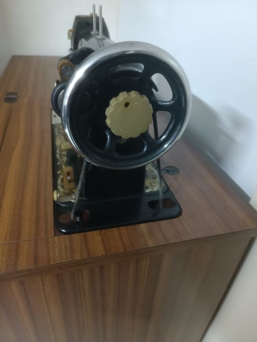 Máquina de costura singer