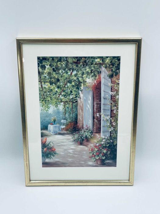 Grafika w ramce złoconej przedstawiająca wyjcie na ogród.