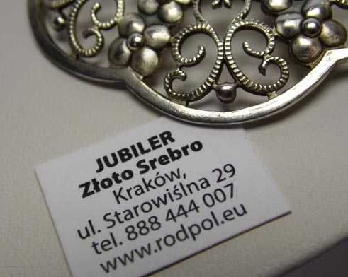 Srebrna ażurowa broszka kwiaty.