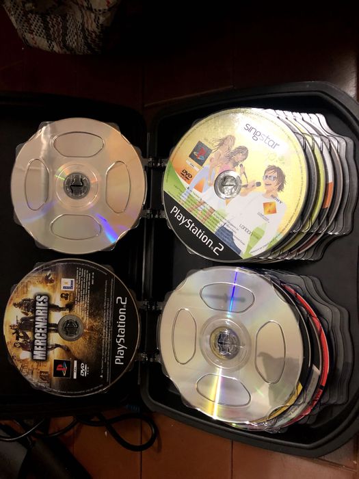 Playstation 2 + cartão memória/jogos/microfone singstar/câmara eye toy