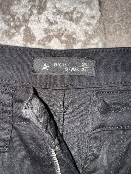 Джинси чорні кльош