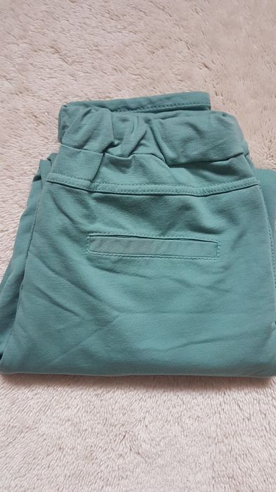 Dresowe włoskie spodnie nowe.