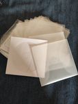 49 capas individuais de papel e plástico de CDs DVDs