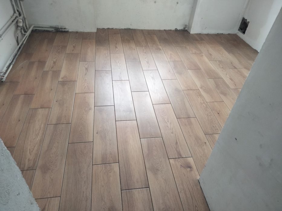 Укладання плитки .