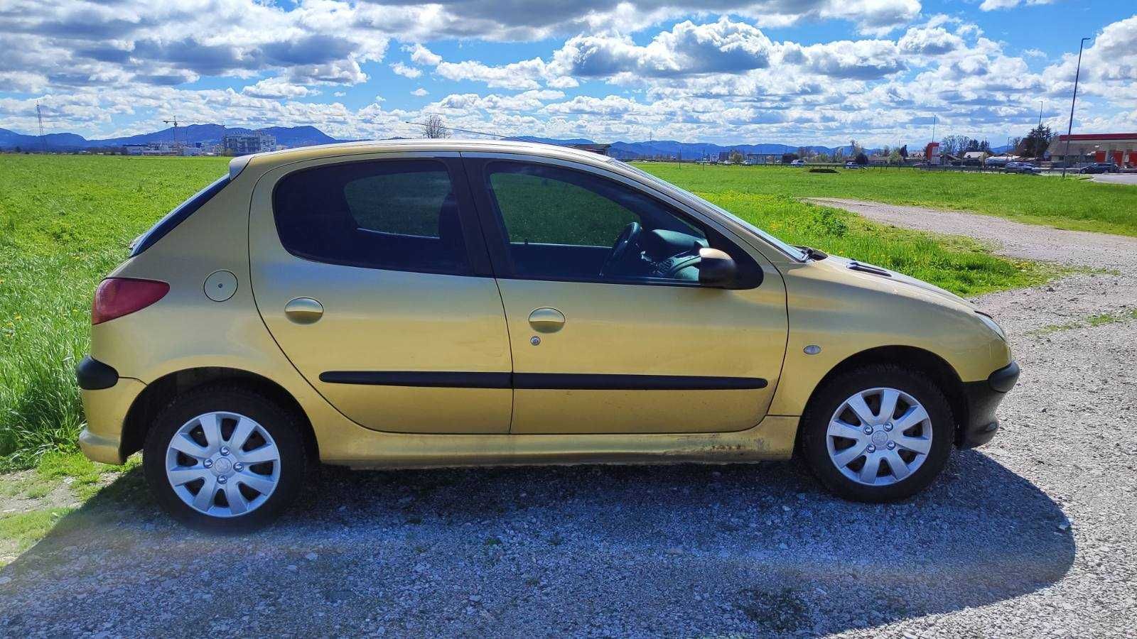 Peugeot 206 (2004р./1.4i)