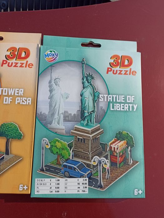 Trzy paczki Puzzli 3D Wieża Eiffla,krzywa wieża i statua wolności