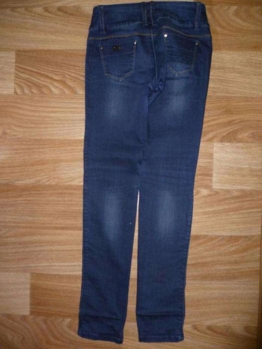 Женские джинсы, состояние новых