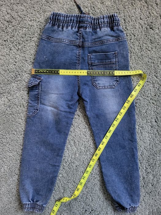 Spodnie typu jogger r. 122 reserved stan idealny