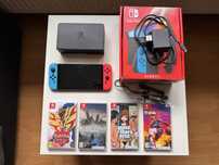 Nintendo Switch OLED + komplet + 4 gry – stan bardzo dobry