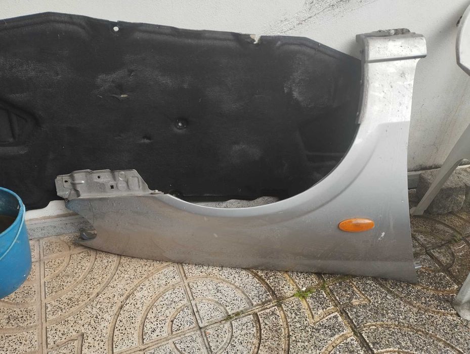 guarda-malas Nissan Almera II hatchback 1.5 dci