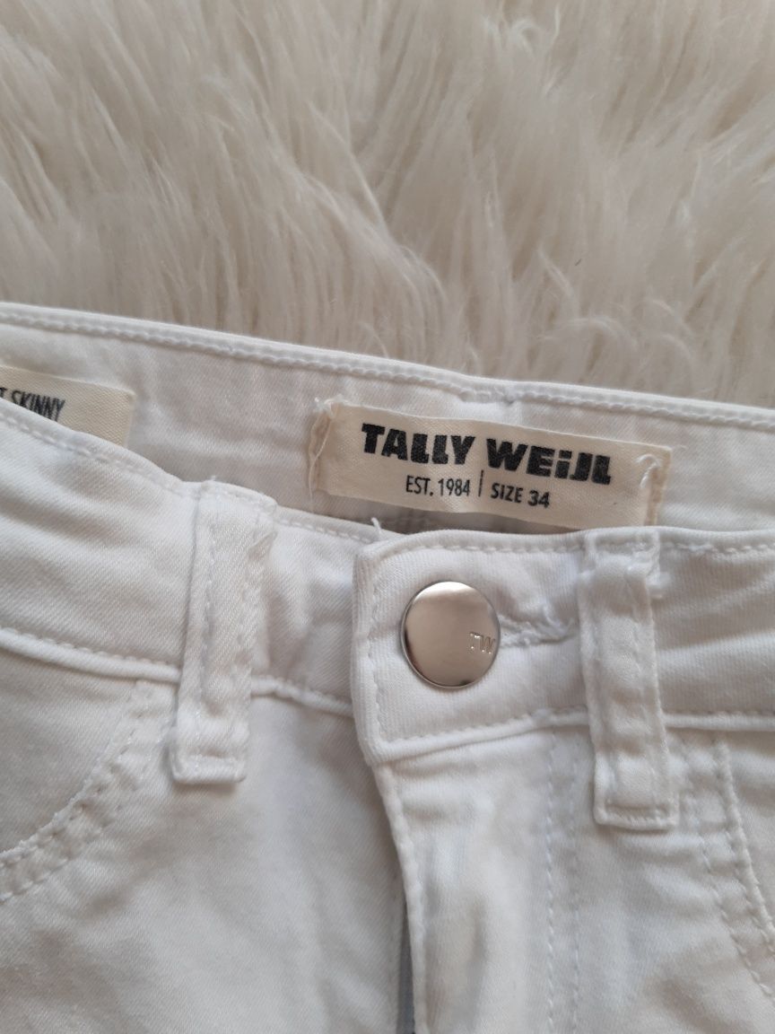 białe skinny jeans z dziurami 34 XS