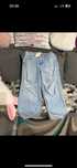 Spodnie jeans z dziurami