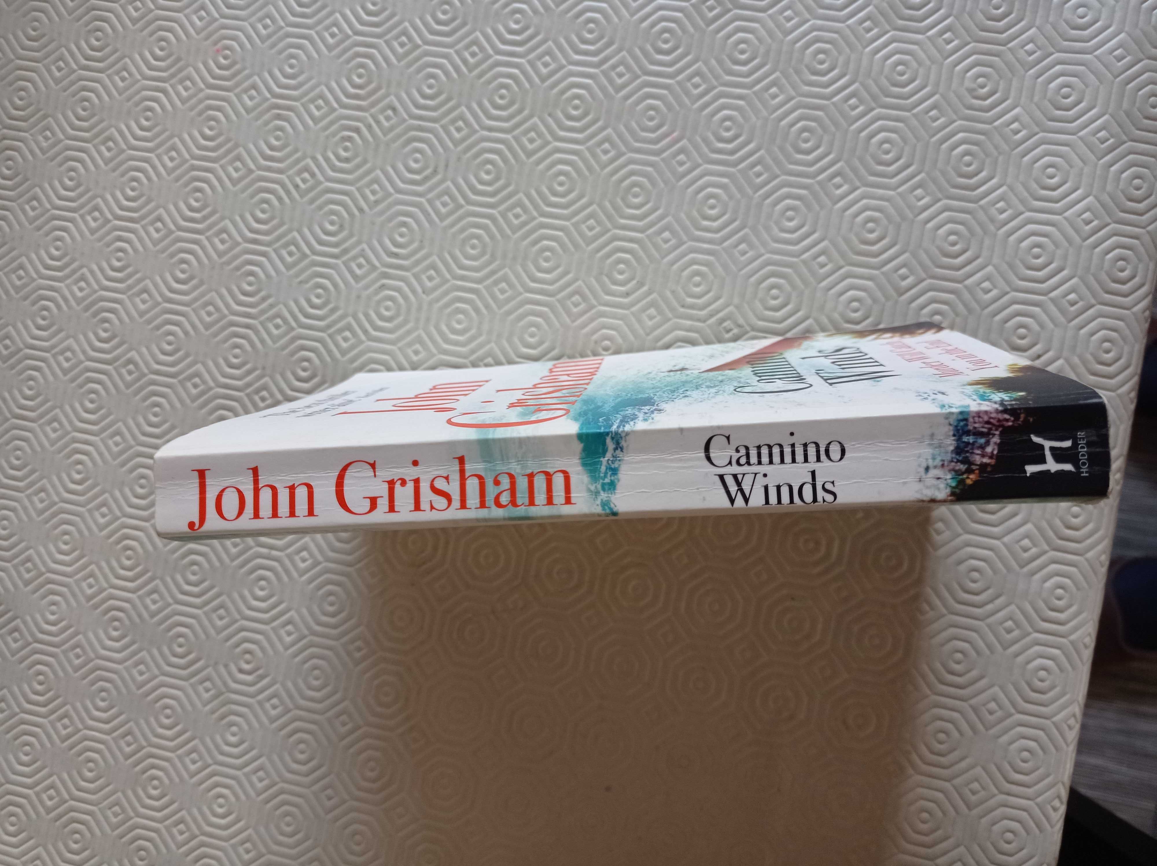 Livros em inglês de John Grisham, Joel Rosenberg e John Dunning