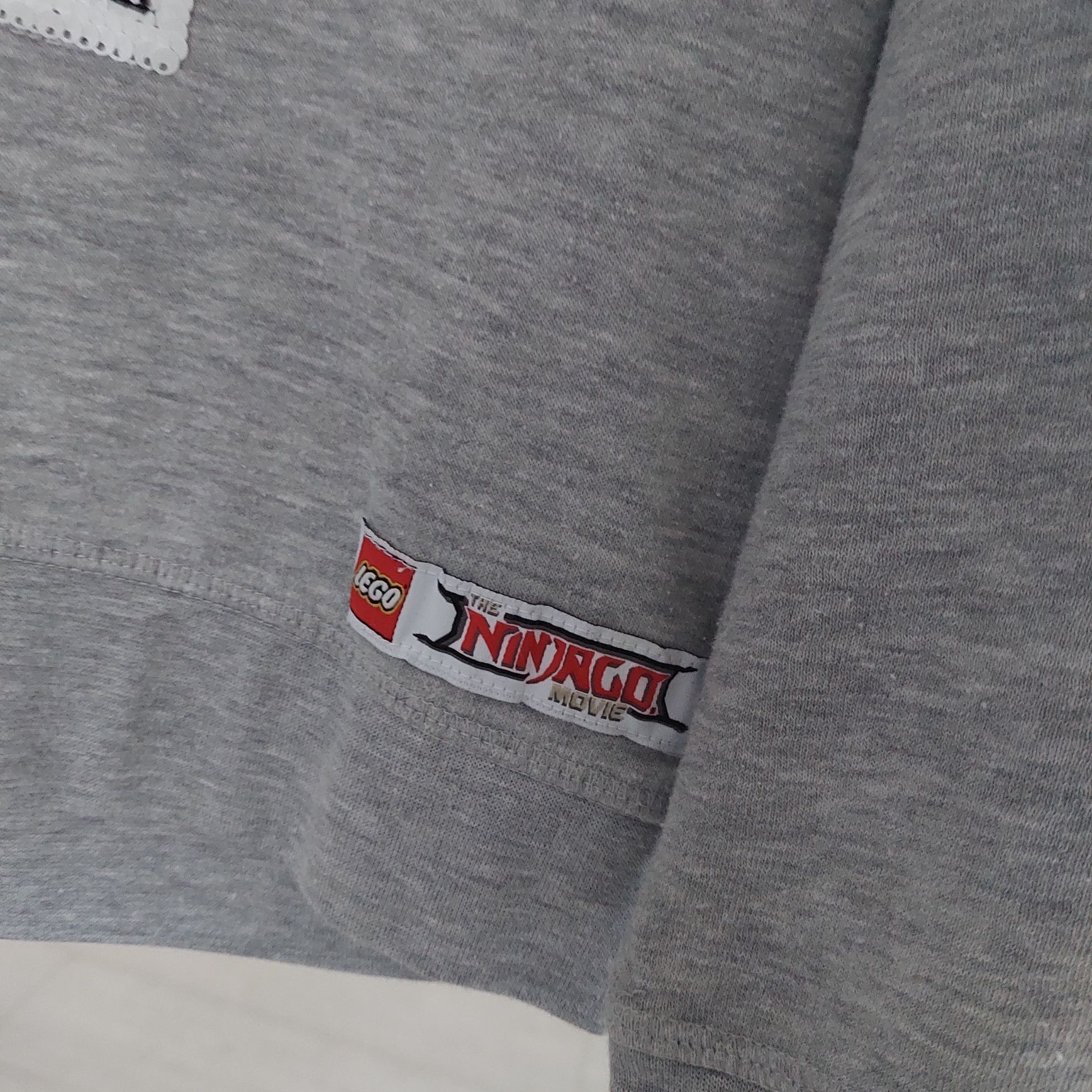 Bluza H&M NINJAGO Kai Lloyd cekiny 134 140 szara