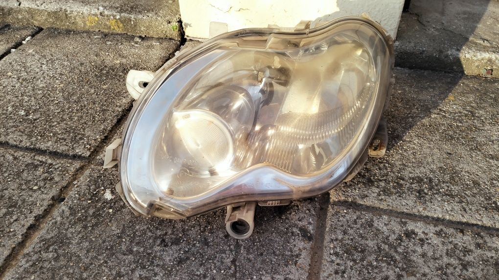 Farol esquerdo Smart 2002