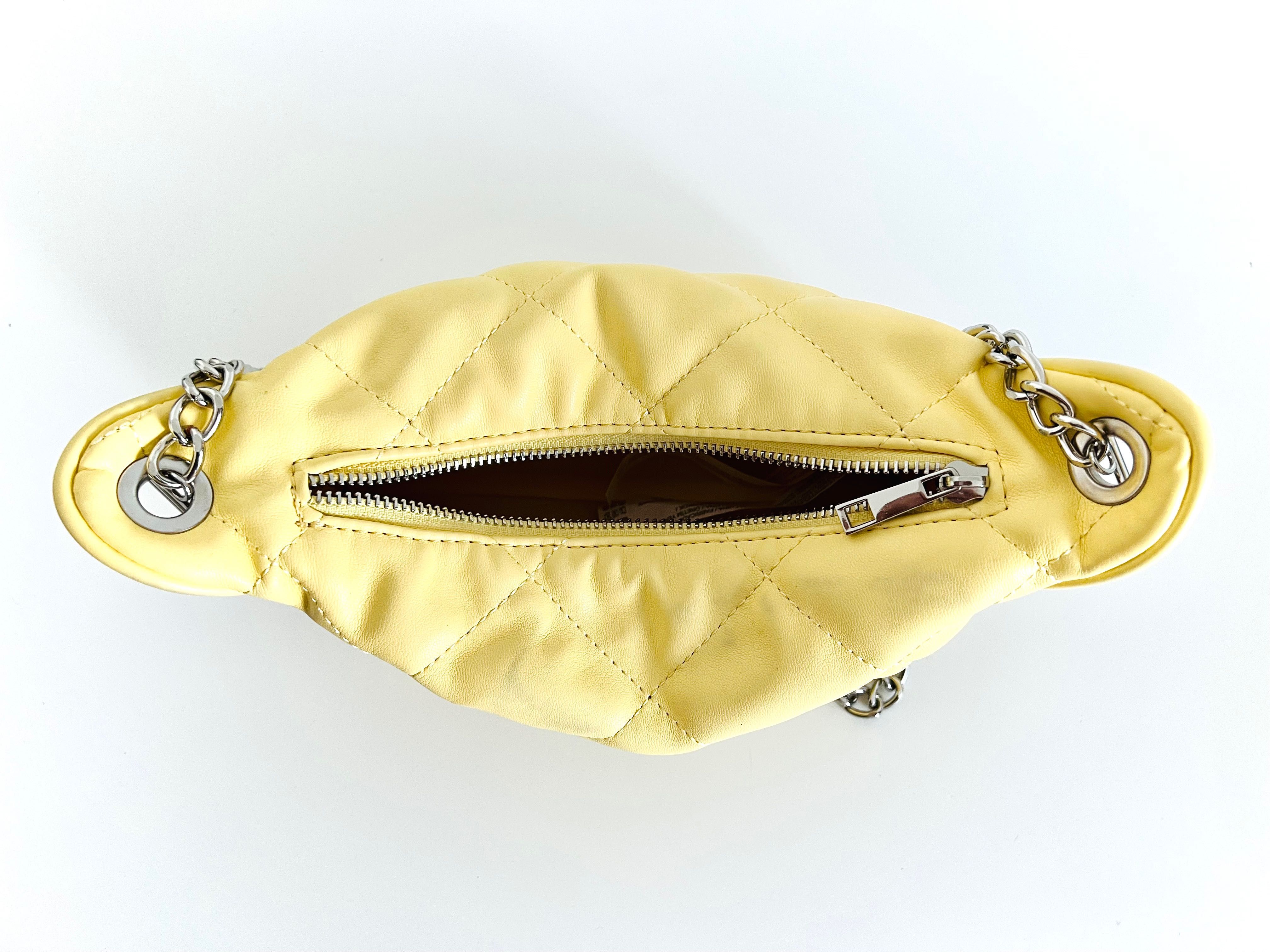 Damska torebka listonoszka firmy Stradivarius żółta