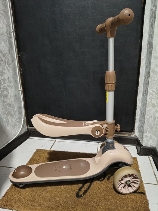 Дитячий самокат з регулюванням