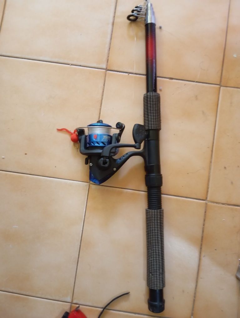 2 Canas de pesca  c/ carrete usadas