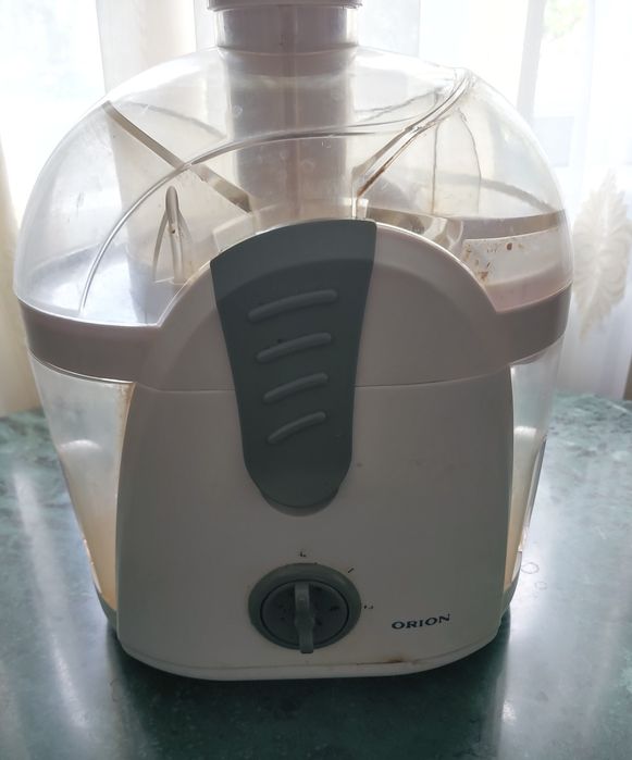 Соковыжималка Orion.