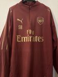 Blusa arsenal oferecida á mao por (Sal Bibbo) treinador de guardaredes