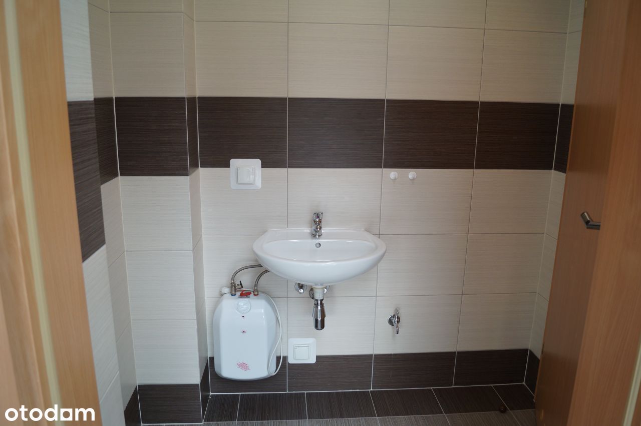 Lokal handlowo - usługowy 65 m.