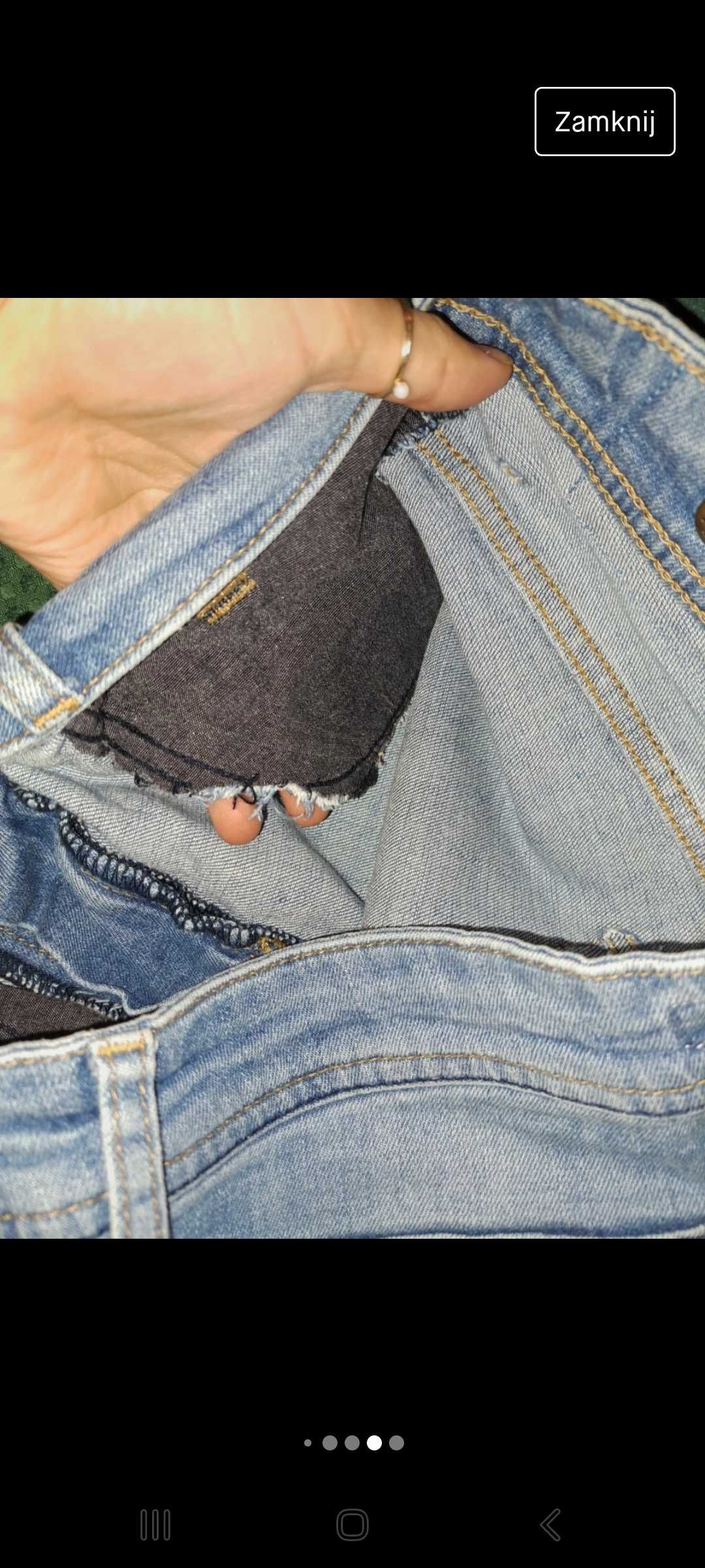 Spodnie dżinsy jeansy z dziurami